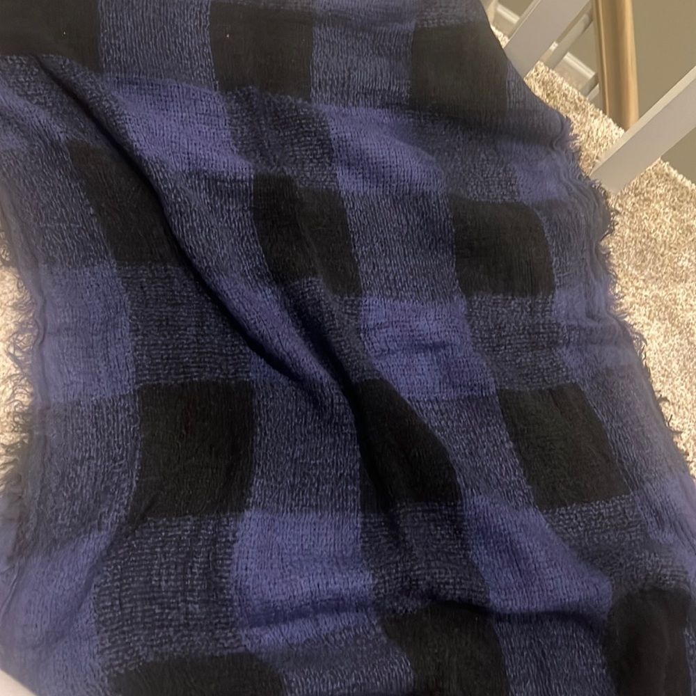 Gently used black and blue knit scarf
